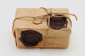 Paper parcel on a white background.
