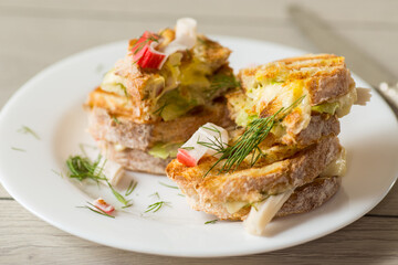 Sandwiches with vegetable and cheese filling