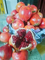 Fresh pomegranate stack on each other for service. Delecious, sweet and juicy fruit pomegranate. Pomegranate is a potent antioxidant.
