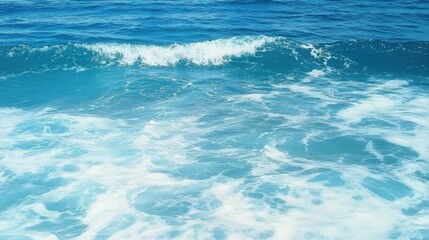 Fototapeta premium Pure blue turquoise water texture of the ocean sea with foam from and waves