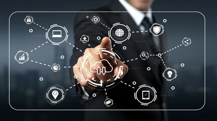 Businessman Interacting with Digital Cloud Technology Interface Representing Connectivity and Data Management in Modern Corporate Environment