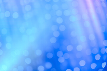 blurred focus of decorative lights in blue background