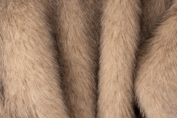Texture of faux fur as a background, top view.