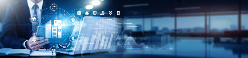 A property manager using a tablet with a digital interface overlay showing real estate data, market trends, technology graphs for analysis, performance, projections, optimization, investment, tracking