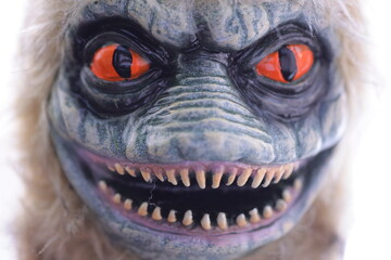 A detailed view of a frightening mask, great for horror-themed projects or Halloween decorations.
