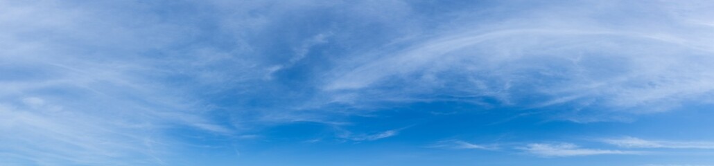 Fototapeta premium Blue sky background with tiny clouds. Cloudscape - Blue sky and white clouds. Clouds with blue sky