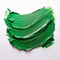 Green acrylic paint stroke creating dynamic texture on white background
