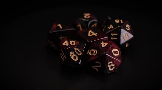 Fantasy RPG red Dice set isolated 360 rotation black background