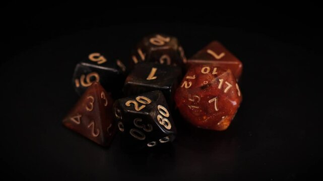 orange Dice set isolated 360 rotation black background Fantasy RPG