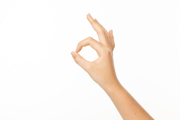Woman hand ok sign on a white isolated background