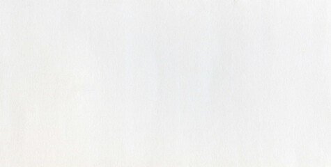 Surface of white paper or cardboard, background, texture. Backdrop of white paper surface with wear traces. Paper piece with elements of light contamination. Smooth, bright, white paper surface