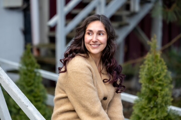 Elegant woman, young woman, portrait, nature, outdoor portrait, natural beauty, elegance, harmony, calm, peaceful, serene, soft light, warm colors, feminine Elegant portrait of a young woman in nature