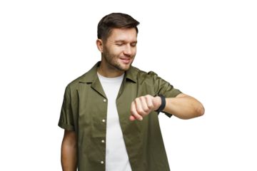 Man checking watch with a slight smile while dressed in a casual green shirt and white t-shirt