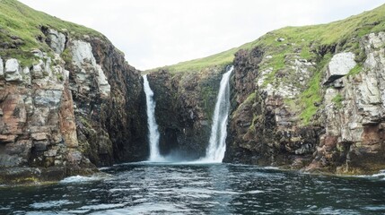 Obraz premium Twin Waterfalls Cascading into Ocean Cove