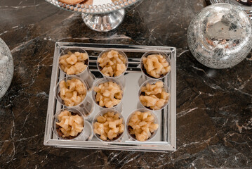 Wedding table with snacks, ham, crayfish and salads