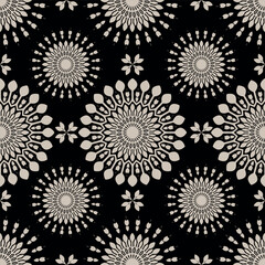 Mandala flower pattern. Mosaic floral motifs on a black background. Beaded geometric grid print. Vector Illustration.