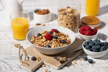 breakfast with homemade granola with nuts and berries