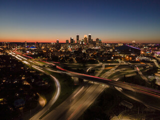 Minneapolis skyline at dusk with light trails