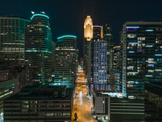 Aerial night view of Minneapolis, Minnesota, featuring glowing skyscrapers