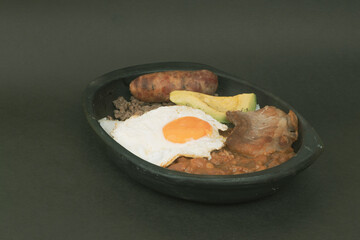 Tray paisa the most representative dish of Colombia
