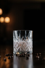 creamy coffee bean cocktail on wooden table