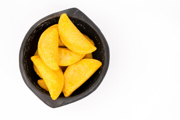 Colombian empanada with spicy sauce 