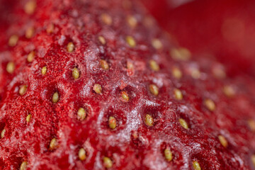 A detailed close-up of vibrant red freeze-dried strawberries, showcasing their texture and natural appeal. Perfect as a healthy snack or for culinary use.