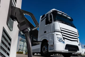 Electric vehicles charging station on a background of a truck
