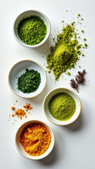 A variety of detoxifying herbs and spices in bowls.