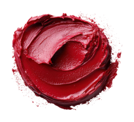 Bright red creamy lipstick swirled in a circular pattern isolated on transparent background