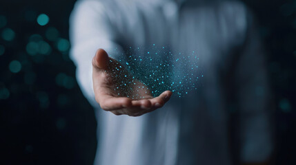 person holding shimmering particles in their hand, symbolizing innovation and creativity