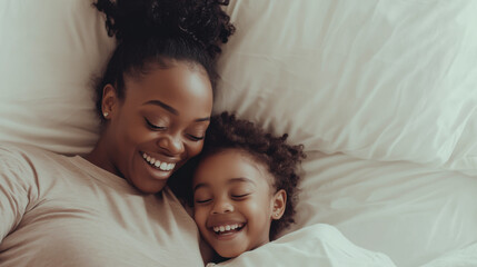 Fototapeta premium Loving moments shared between mother and daughter in cozy bed during morning light