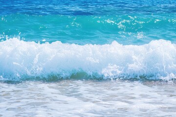 Fototapeta premium Ocean Waves Gradient: Waves crashing onto the shore with colors transitioning from deep navy blue to turquoise and white foam