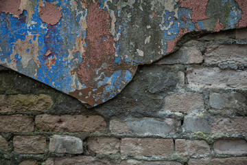 Old distressed wall bricks background with cracked paint