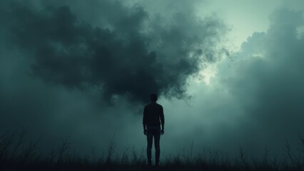 Fototapeta premium An abstract representation of stress as dark, heavy clouds swirling around a person, their silhouette barely visible beneath the oppressive weight of anxiety and worry.