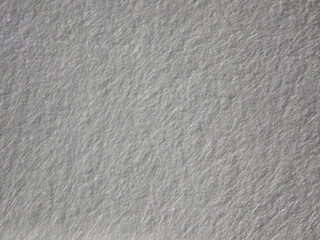 The textured surface is gray as a background. Felt. High quality photo