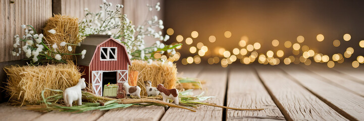Naklejka premium Rustic Farm Scene Miniature Barn Hay Animals Lights