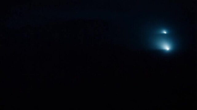 Dynamic Lights. Moving and Flashing Lights on Black Background
