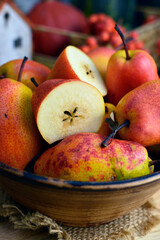 RED WILLIAM PEARS whole fruit and cut in halves, close up, selection focus.