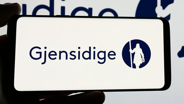 Stuttgart, Germany - 01-14-2025: Smartphone with logo of Norwegian company Gjensidige Forsikring ASA on screen. Focus on phone display.