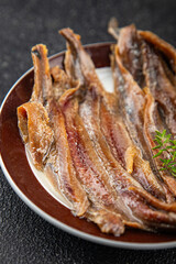 Anchovy fillet fish seafood snack aperitif fresh tasty food dish gourmet food background on the table rustic food top view copy space pescetarian diet