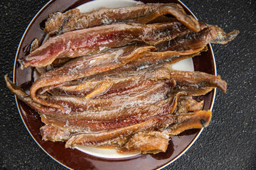 Anchovy fillet fish seafood snack aperitif fresh tasty food dish gourmet food background on the table rustic food top view copy space pescetarian diet
