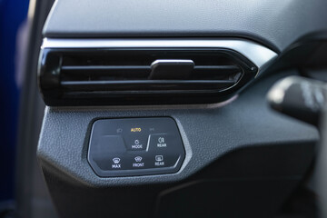 Fototapeta premium Headlight switch, on off mode lights, automatic control of switching on and off the car light. Mode of lamp electric car. Lights switch cars, car interior. Modern LED Car IQ Headlights.