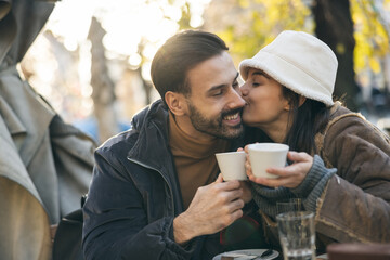 Couple Enjoying Warm Coffee