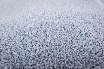 Frost ice texture background surface closeup on dark background