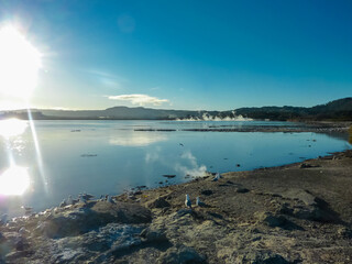 Rotorua lake, Bay of Plenty Region, North Island New Zealand. Geothermal activity as steam rising...