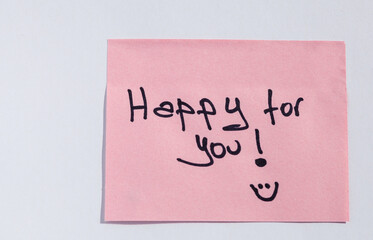 Pink sticky note with handwritten 'Happy for You!' message