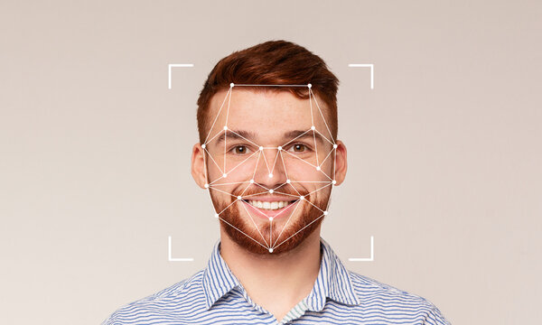 A smiling man is shown in front of a plain background with facial recognition technology overlay. This technology highlights key facial features for identification purposes.