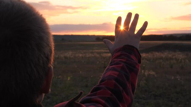 sign hand finger sunset gesture, boy child son kid sun, childish happiness journey sky, child silhouette, sunset between hands boy, future summer changes, faith religion dream, pull his hand sun