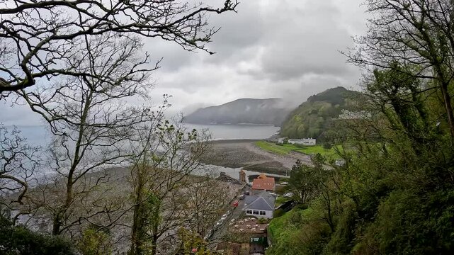 Lynmouth is a village in Devon, England, on the northern edge of Exmoor. The village straddles the confluence of the West Lyn and East Lyn rivers.
